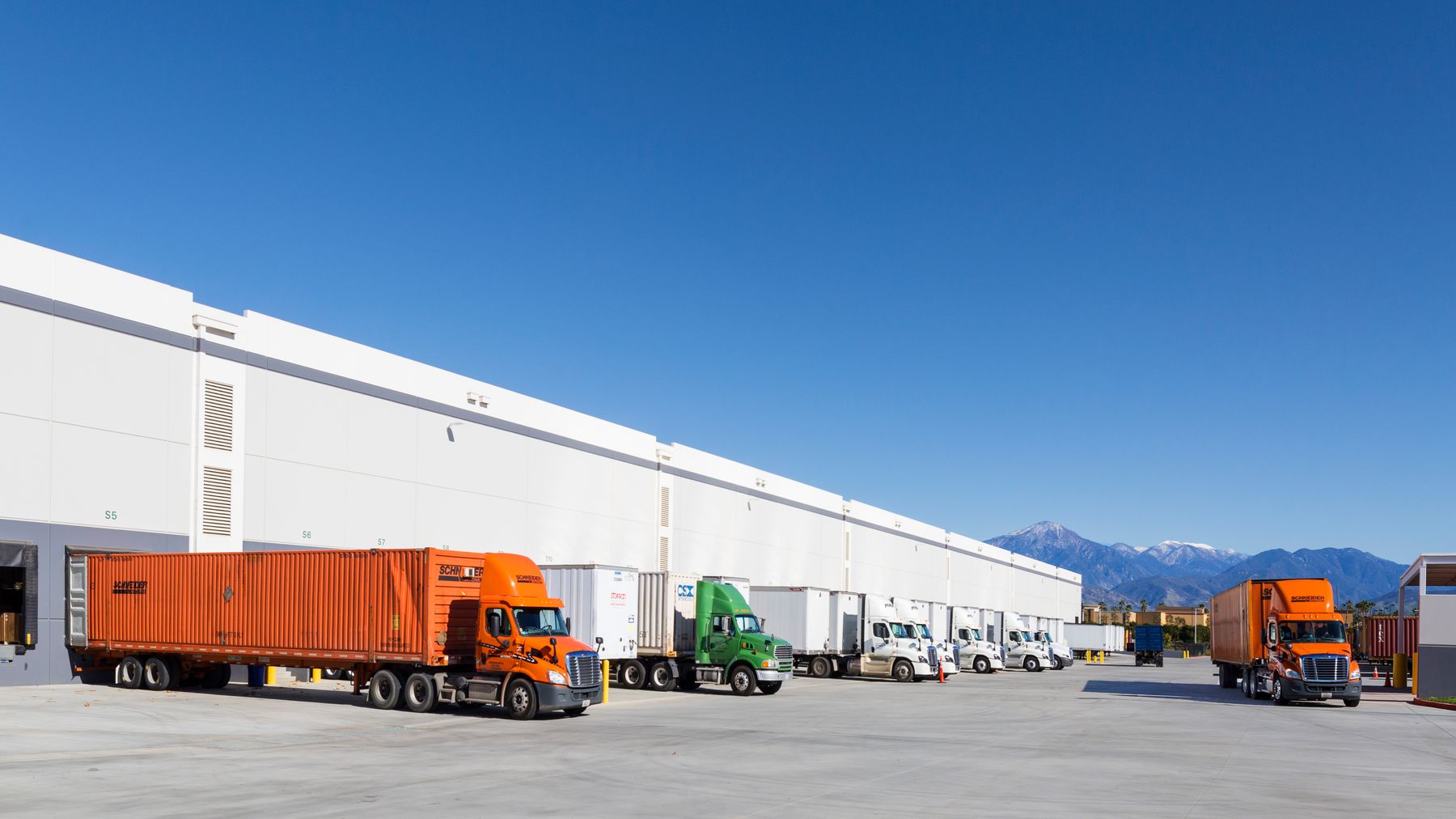 Exterior shot of the building and busy truck court at Prologis Redlands DC 11
