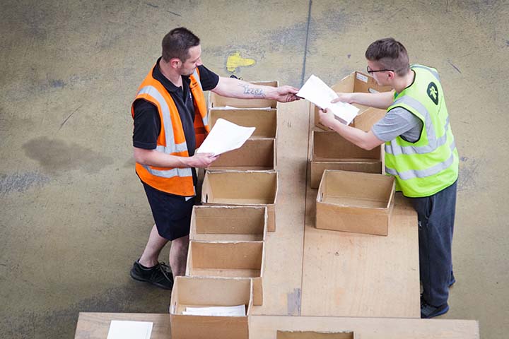 Prologis Expands Community Workforce Initiative to Miami Workers pack boxed in Miami location