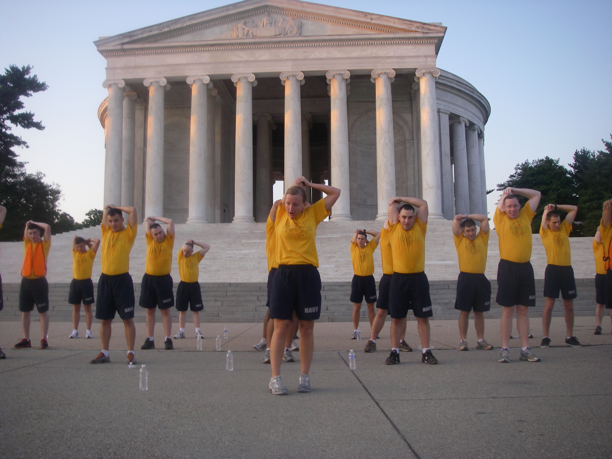 Lisa Vincent leading a training session in front of Jefferson Memorial 