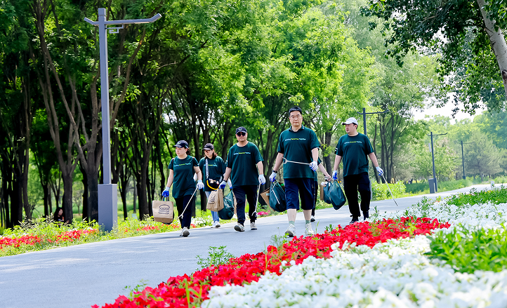 A group of people walking on a path