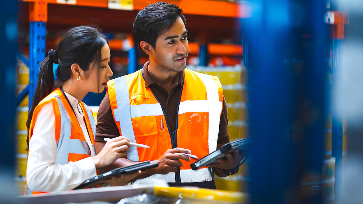 Two warehouse workers