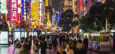Busy street at night in Shanghai