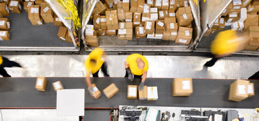Workers picking products in a Prologis warehouse
