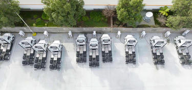 Arial photo of EV trucks in a parking lot