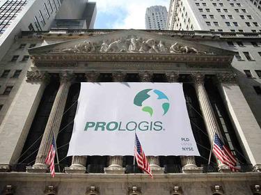 Prologis Timeline - 2011 Prologis logo on a flag outside of the stock exchange building