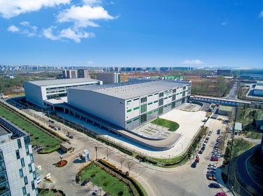 An aerial shot of two multistory warehouses at Beijing Capital Airport Logistics Center in Beijing, China