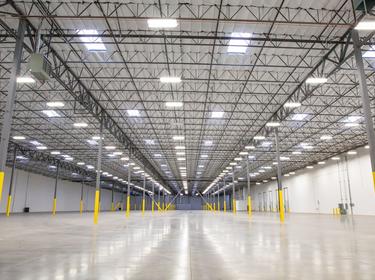An interior shot of an empty warehouse with LED lighting at Prologis Park North 15 Freeway, Las Vegas, Nevada