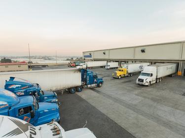 A photo of the truck court at Prologis Park Agave with trucks parked outside