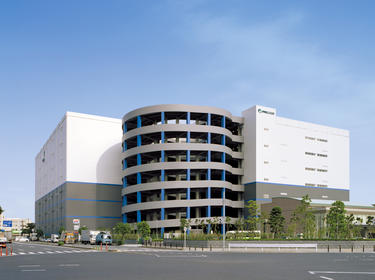 An exterior shot of the warehouse and spiral truck ramp at Prologis Tokyo Ohta