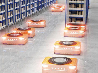 Multiple automated mobile robots moving on a warehouse floor 