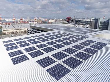 Solar panels on a warehouse roof in Osaka