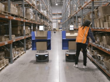 Locus Robots with warehouse workers