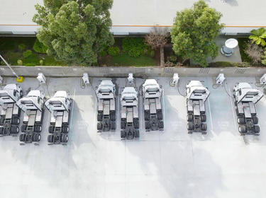 Arial photo of EV trucks in a parking lot