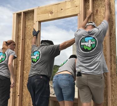 Prologis team members in Orlando, Florida frame a house with Habitat for Humanity on IMPACT Day 2017.