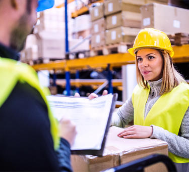 A woman and a man in a Prologis warehouse