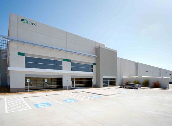 An exterior shot of a Build to suit Prologis Park 212, showing surrounding handicapped parking spots